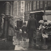 Policeman and flower vendor on a rainy street