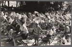 French kids with Indian head-dresses.