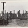 Steelmill and workers' houses. Birmingham, Alabama
