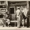 Vicksburg Negroes and shop front. Mississippi