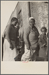 Negroes in the lineup for food at mealtime in the camp for flood refugees, Forrest City, Arkansas