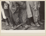 Negroes in the lineup for food at mealtime in the camp for flood refugees, Forrest City, Arkansas