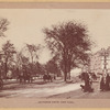 Horse carriages and pedestrians on Riverside Drive