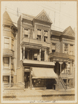 Woodframe & shingled Victorian houses with Cigar & Stationary storefront