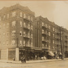 Apartment buildings with storefronts; Levitt's Café, Wine & Liquor store