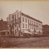 Hotel Martin & Café Martin; small brick buildings with storefronts
