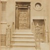 Stoop and doors of brick row house