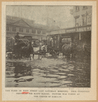 The flood in West Street last Saturday morning. This condition prevailed for many blocks. Picture was taken at the corner of Barclay