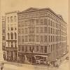 Loft buildings with workers posing in windows: Julius Hart, G Behrend & Co., B.F. Beekman Silk and Straw Goods, 