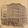Loft buildings with workers posing in windows: Julius Hart, G Behrend & Co., B.F. Beekman Silk and Straw Goods, 