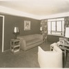 View of living room in apartment unit of the Riverton Houses, in Harlem, New York City, circa 1947