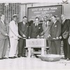 Robert Moses (second from left), Manhattan Borough President Robert F. Wagner (at center), and labor organizer Frank R. Crosswaith (third from right), at the Colonial Park Houses cornerstone laying ceremony
