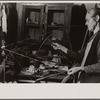Woman running spinning wheel at Crossville, Tennessee Cumberland Homesteads.