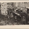 Primitive chicken roost, carved out of hollow log, on farm of rehabilitation client, Boone County, Arkansas