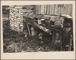 Primitive chicken roost, carved out of hollow log, on farm of rehabilitation client, Boone County, Arkansas