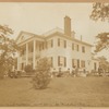 Morris-Jumel Mansion with people on benches