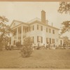 Morris-Jumel Mansion with people on benches