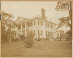 Morris-Jumel Mansion with people on benches