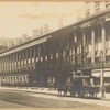 Colonade Row; The Churchman offices; Adams Express Company wagon; public telephone sign