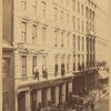 Loft buildings: Ladewig & Haydter, Van Volkenburgh Brothers; men posing for photographer at windows and on cornices