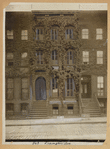 Brownstone row houses with stoops