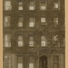 Brownstone row houses with stoops