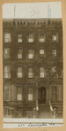 Brownstone row houses with stoops