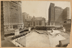 Grand Central Terminal; Hotel Commodore; Hotel Belmont; construction site of future Pershing Square Building; Elevated train station & train