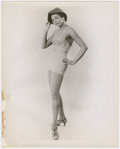 Studio portrait of Nanette Rohan Bearden modeling a swimsuit, circa 1950s 