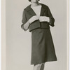 Studio portrait of Nanette Rohan Bearden modeling a woman's suit for the Grace Del Marco Agency, circa 1950s