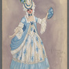 Woman in white and light blue dress