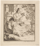 A young girl playing with chicks
