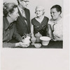 Gwendolyn Bennett, her husband Richard Crosscup and two unidentified women in their antique shop