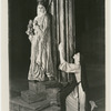 Nun prays to Madonna against pillar in the stage production The Miracle