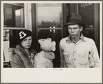 Scene in Smithland, Kentucky, man, woman, and child