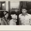 Scene in Smithland, Kentucky, man, woman, and child