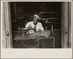 Scene in New Orleans, Louisiana. A street tailor