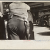 A deputy with a gun on his hip during the September 1935 strike in Morgantown, West Virginia