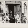 Pastor greeting his parishioners, Linworth, Ohio
