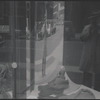 Shop window with reflected self-portrait. New York, NY