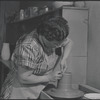 Woman making pottery