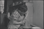 Woman making pottery