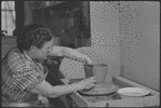 Woman making pottery