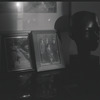Framed photographs and sculpture