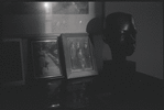 Framed photographs and sculpture