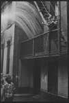 Boys playing on fire escape. New York, NY