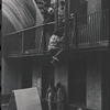 Boys playing on fire escape. New York, NY