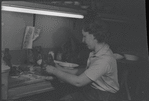 Woman making pottery