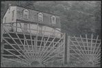 House with wooden fence