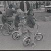 Boys riding bicycles [Knokke, Belgium?]